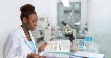 African-american female researcher in lab