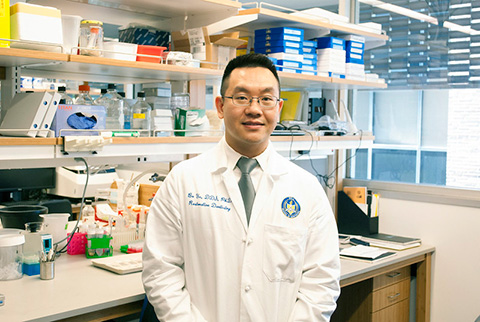 Bo Yu in a laboratory. 