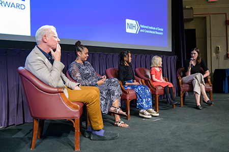 Drs. Michael Collins (far left) and Alison Boyce (far right) spoke with patient community members (from left to right) Voncia Monchais, Jianna Monchais, and Lucy Gerhart about their experiences with FD/MAS.