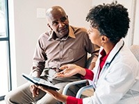 A patient consulting with a clinician.