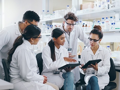 a group of researchers talking