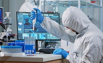 Lab technician working in a lab