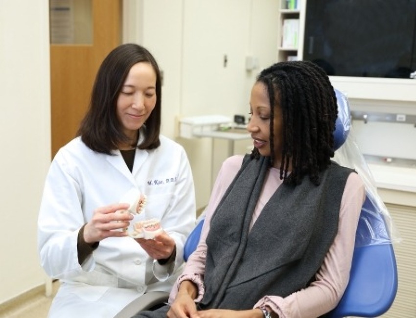 Dentist with patient