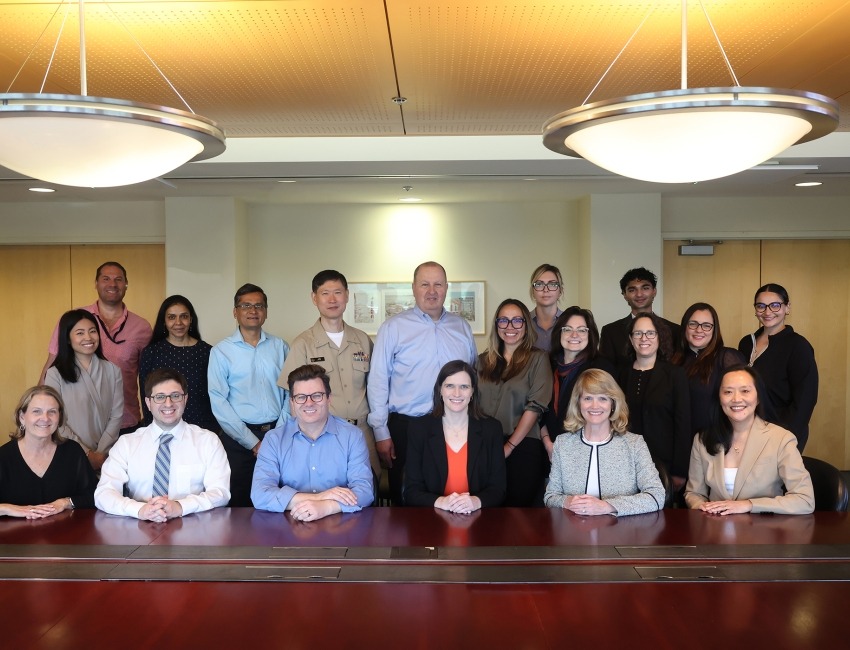 A group photo of NIH staff at a  a site initiation visit for the first-in-human trial of Jansen's disease